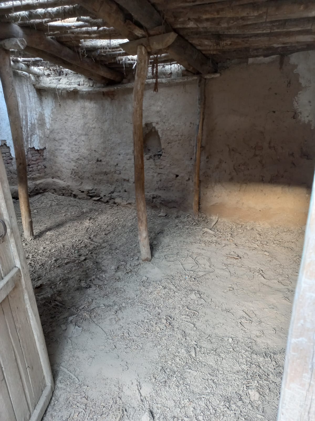 Interior of the village home in Pakistan — the room where the journey began